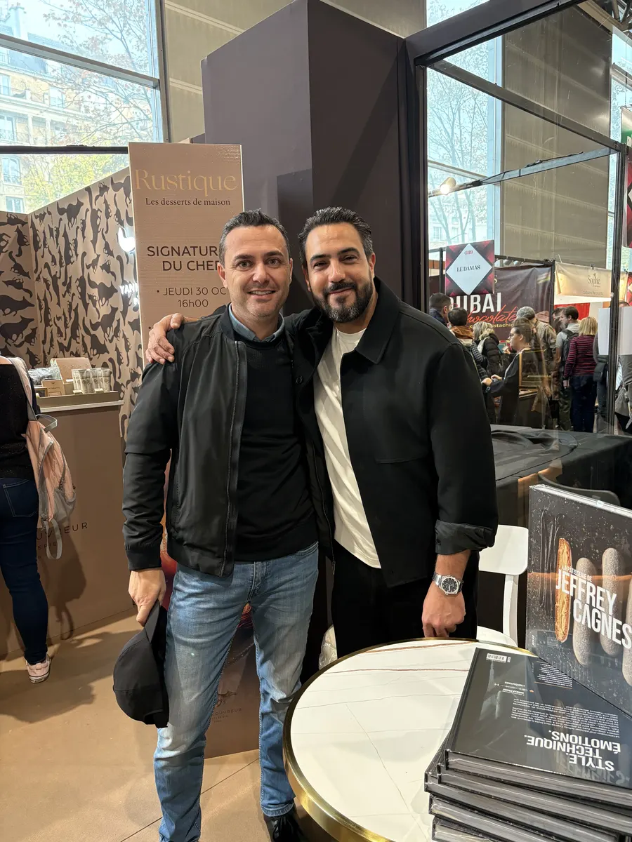 Ali Al Ghoul at a French pastry book signing event ("Signature du Chef") in Paris.